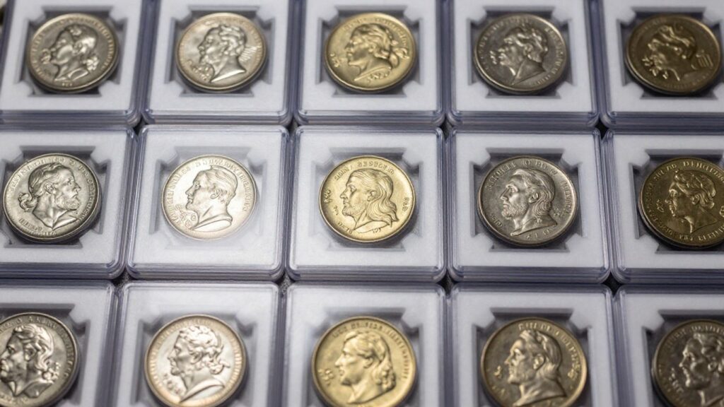 Coin albums with visible coin collections