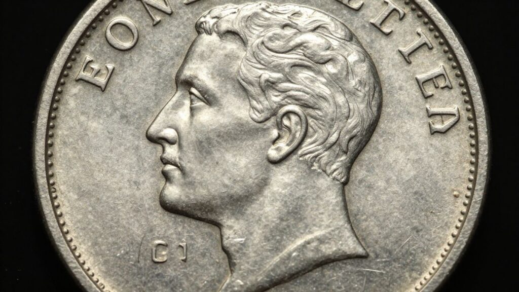Coin with a weak strike, showing faint details.